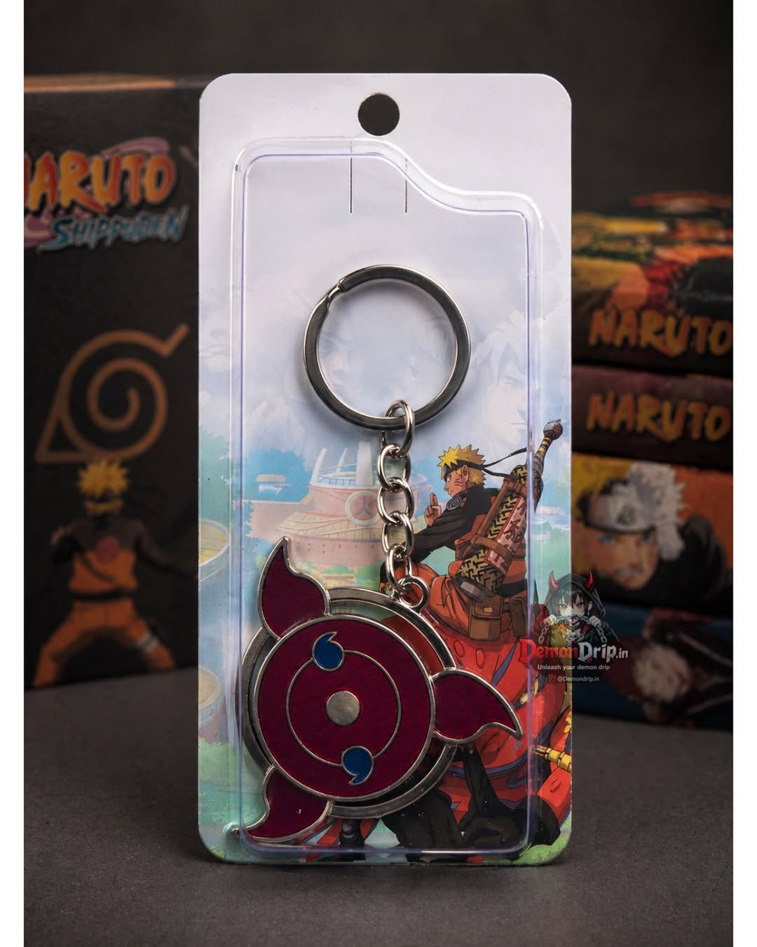 Naruto Shippuden Sasuke Uchiha Mangekyō Sharingan Enamel Keychain – Premium Fuma Shuriken Metal Keyring with Awakened Tomoe Design & Collector's Display Packaging
