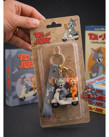 Tom and Jerry Scooter Edition 3D Keychain – Premium Soft Silicone Cat & Mouse Retro Figure with Vintage Ride, Matching Wrist Strap & Luxury Gold Hardware